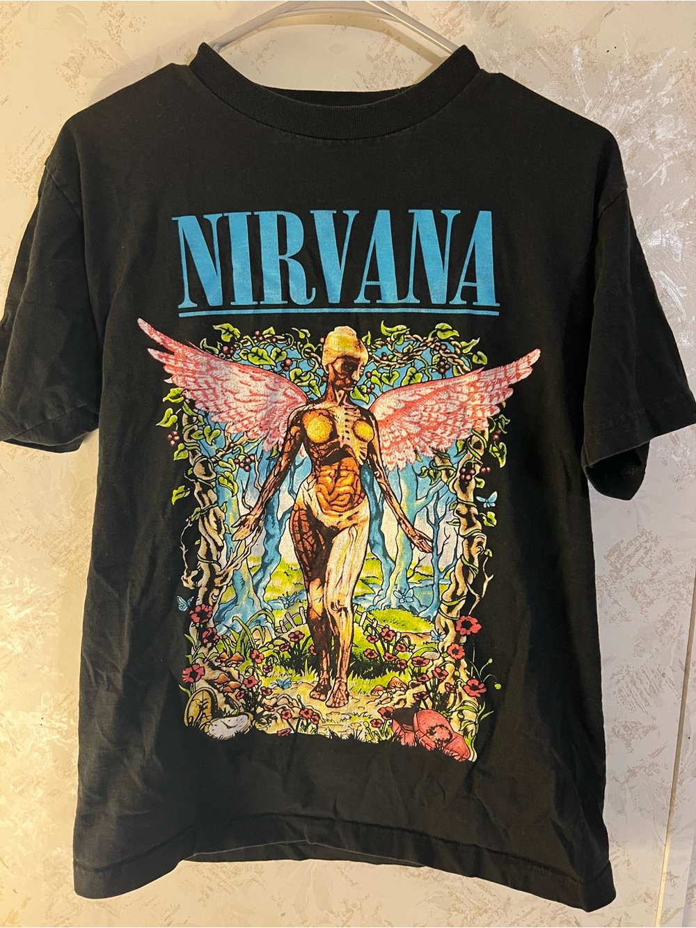 NIRVANA Black Tee with Turquoise Logo and Multicolor Angel Print